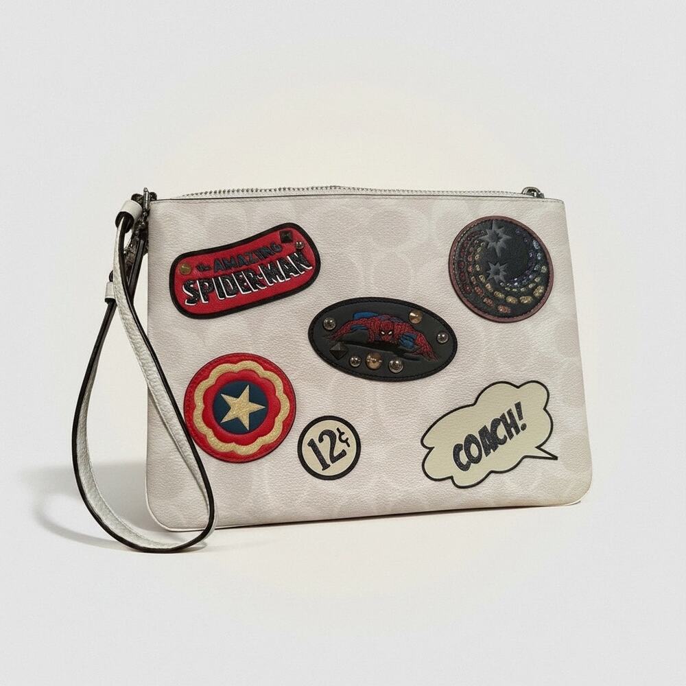NWOT Coach x Marvel Gallery Pouch signature canvas Marvel patches wristlet
